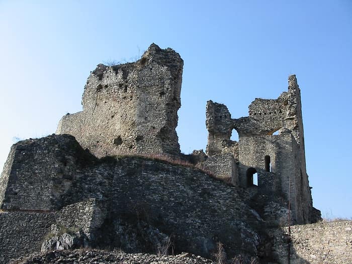 Divín Castle ruin on its hill above the village
