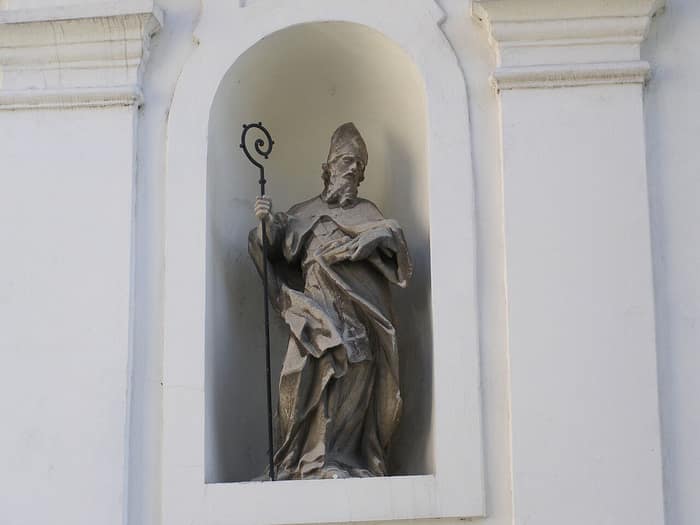 The Baroque Holy Trinity Church and its courtyard in Podhradie